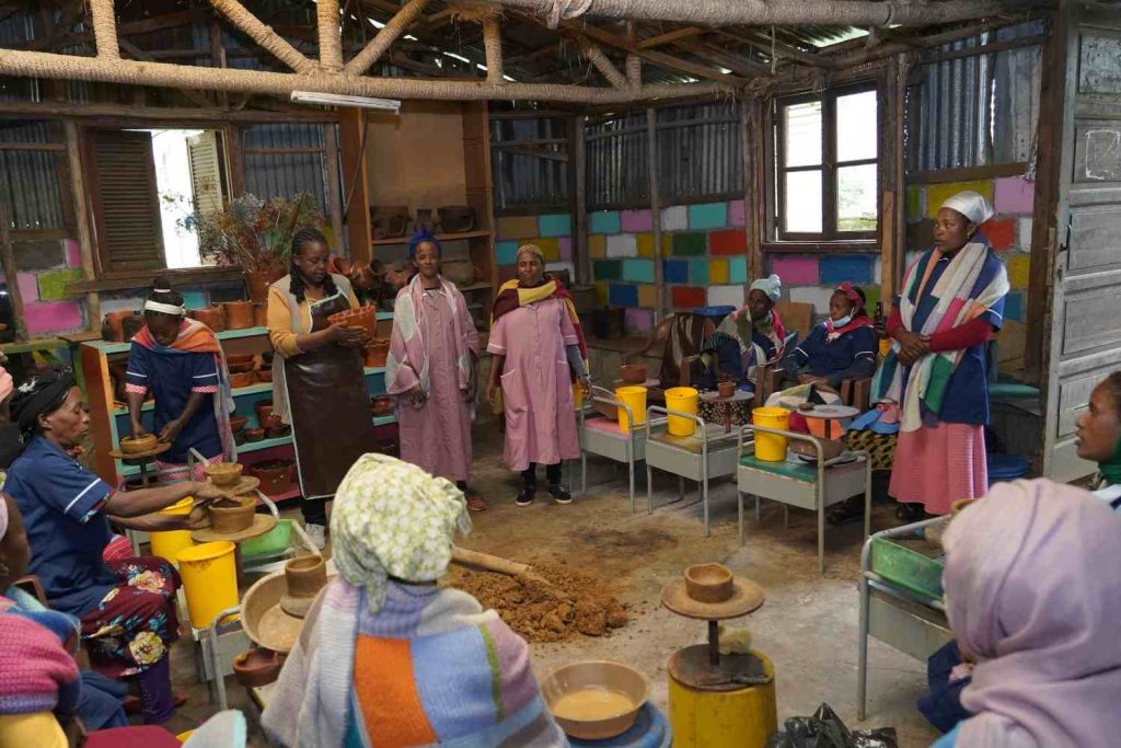 Women learning pottery